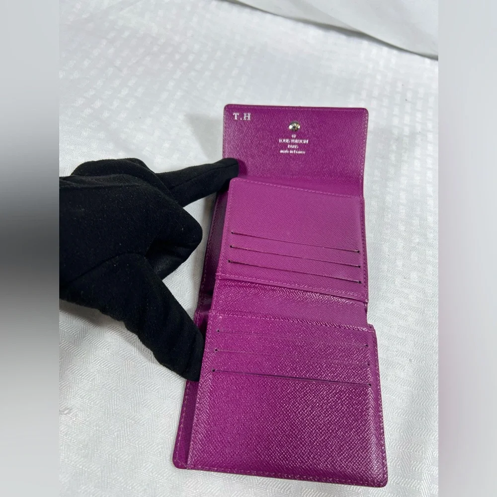 1136: Louis Vuitton Epi Leather Trifold Wallet Purple